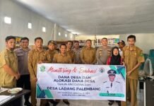 Bhabinkamtibmas Polsek Lebong Utara Hadiri Monev Penggunaan DD di Desa Ladang Palembang